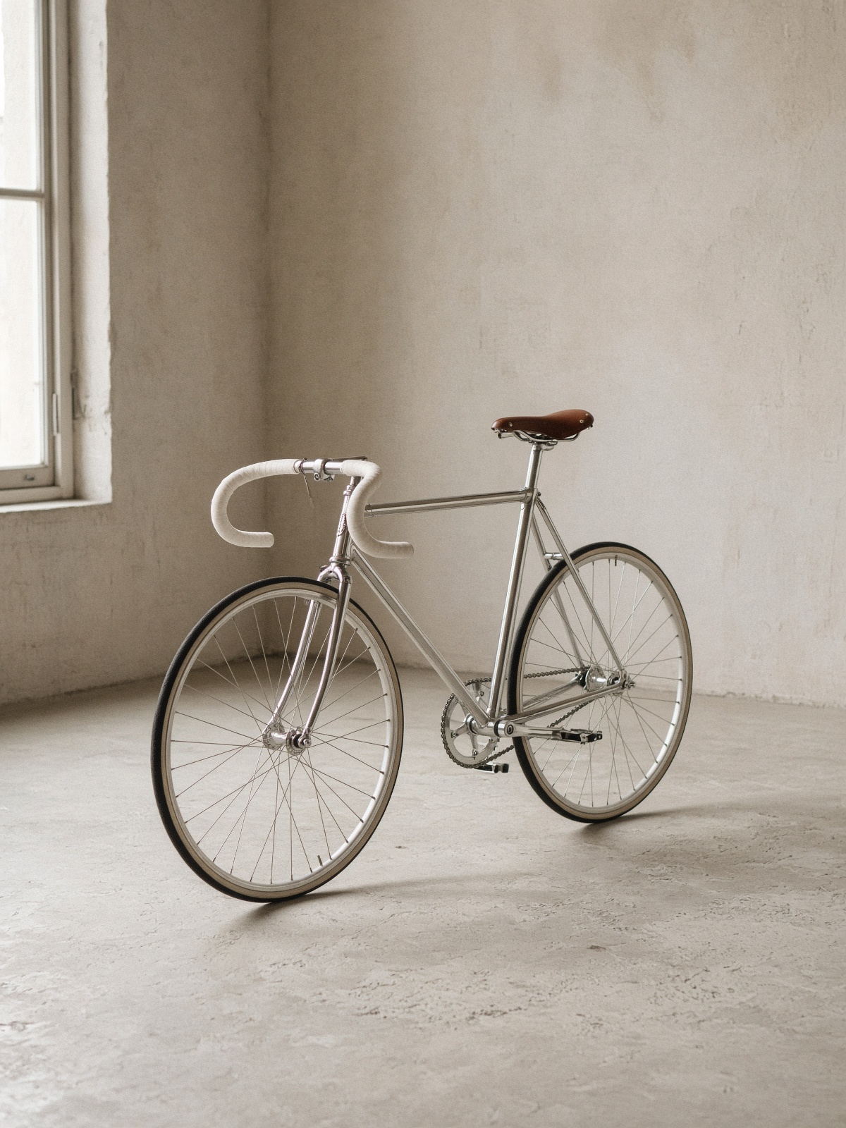 Polished steel Holdsworth track bicycle in the studio